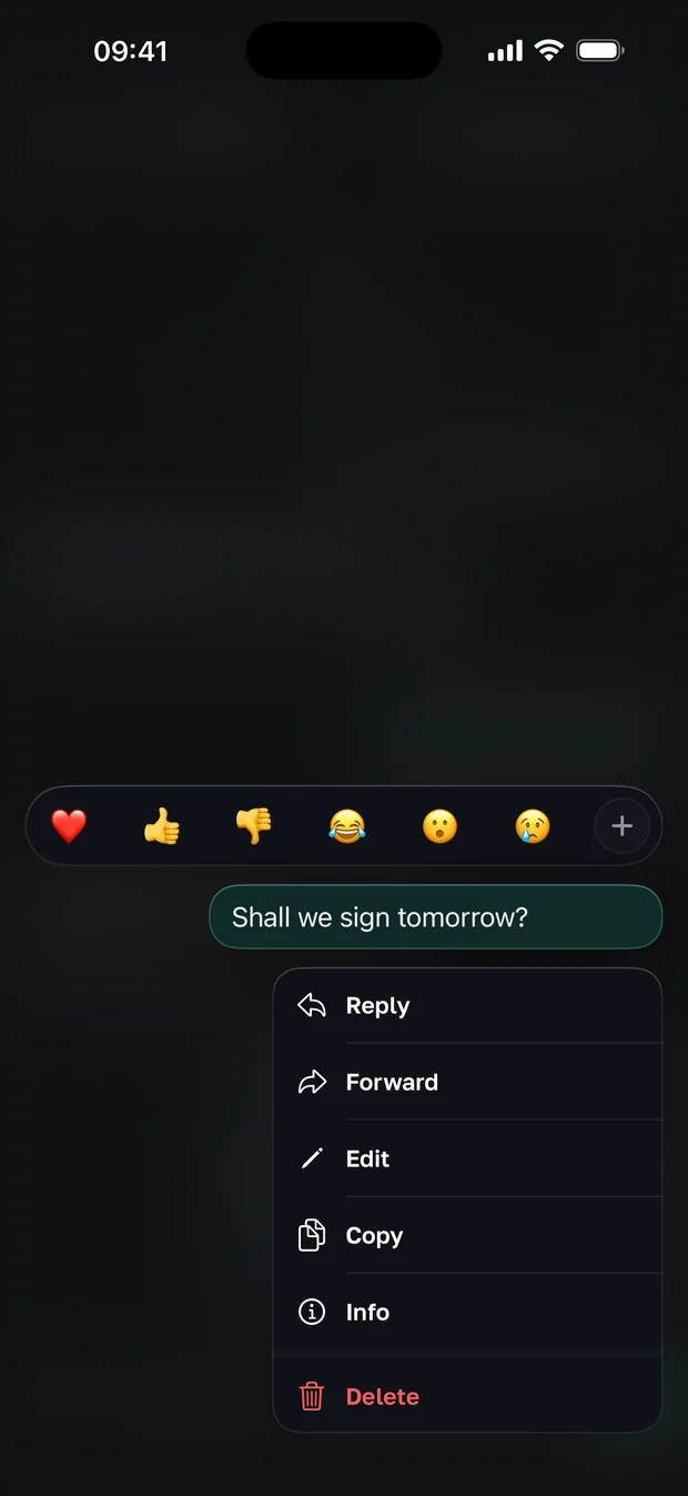 A long press on a message opens reactions and actions