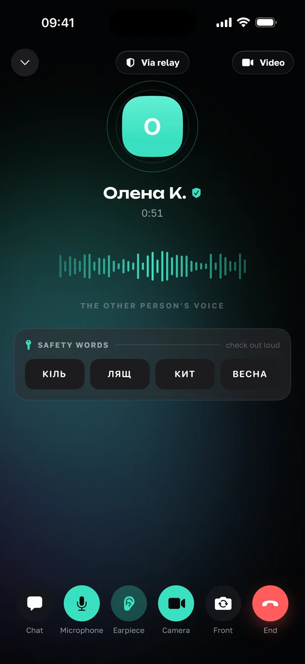 The video call screen: the relay badge, the voice wave and four safety words